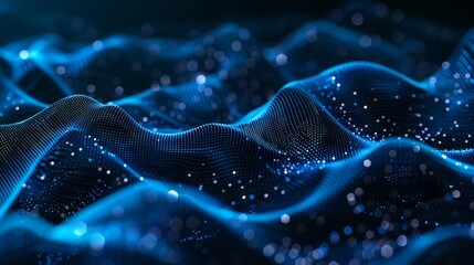 Fototapeta premium Blue particle waves digitally illustrated on a gradient dark blue background