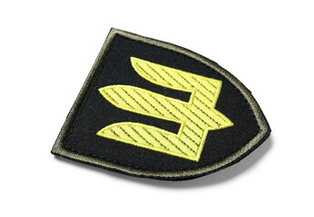 Military badge of Ukrainian army with trident isolated on white background