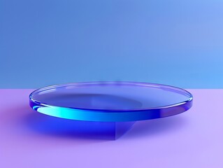 A blue glass plate on a pink and blue background.