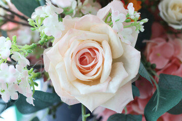 Beautiful fake roses in a cafe