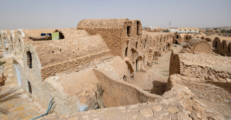 Ghorfa storage graneries of the traditional Berber mud brick fortified Ksar of Hedada or Hadada,...