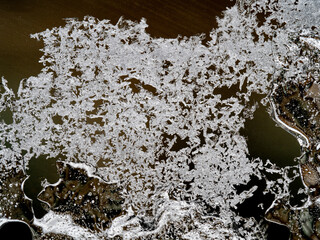 brilliant abstract ice like crystals formed on a window in winter