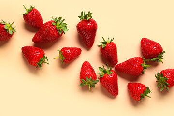 Sweet fresh strawberries on yellow background