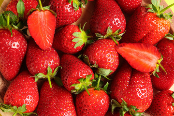Sweet fresh strawberries on wooden background, closeup