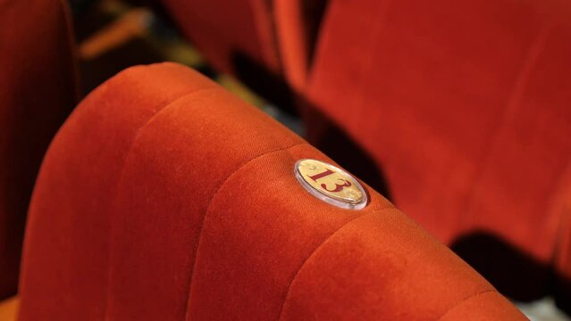 empty spectator seat with number thirteen 13