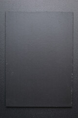 blank black notebook on shine black background