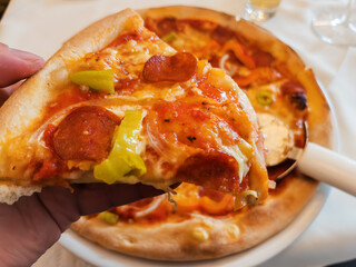 Close-up Spicy Pepperoni Diavolo Pizza Slice