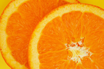 Summer fruit background concept, macro shot of a slice of fresh orange
