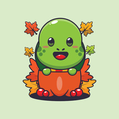 Cute turtle in a pumpkin at autumn season