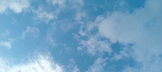 beautiful sky background with clouds in blue sky. Sunlight and Clouds