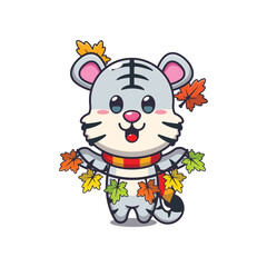 Cute white tiger with autumn leaf decoration