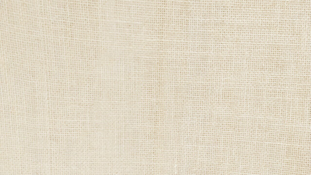 Brown cotton fabric cloth texture for background, natural textile pattern. Brown color hessian sack cloth pattern.