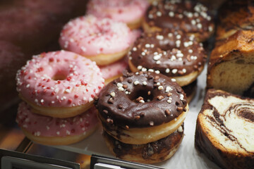 chocolate donuts display for sale at local store 