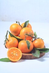 Jeruk santang madu ( citrus sinensis) . Often consumed during Chinese New Year, isolated on white background
