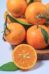 Jeruk santang madu ( citrus sinensis) . Often consumed during Chinese New Year, isolated on white background
