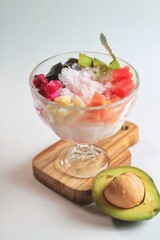 Es buah or sop buah-is an Indonesian iced fruit cocktail dessert. This cold and sweet beverage is made of diced fruits mixed with shaved ice or ice cubes, and sweetened with liquid sugar or syrup

