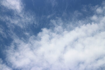 blue sky with white, soft clouds