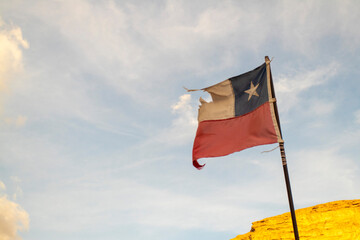 Chilean flag torn by the wind