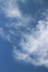 blue sky with white, soft clouds