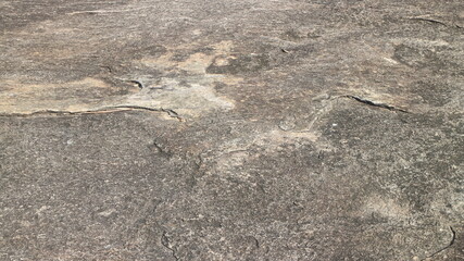 Details of sand stone texture, closeup shot of rock surface with vignette at cover and bright spot...