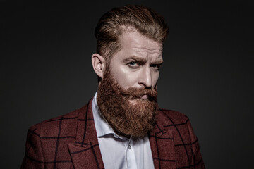 Business man in elegant tailored suit. Formal tailored suit. Gentleman menswear. Bespoke suit. Bearded man in tailored formal menswear. Man businessman in bespoke formalwear. Mens attire