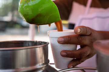 Preparation of chocolate atole at street stall in Mexico City