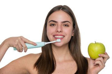 Woman toothy smile isolated on white. Woman brushing teeth with electric toothbrush. Girl brushing...