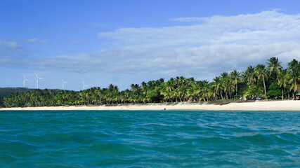 Pristine beach with clear blue water and fine white sand in Asia