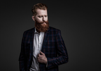 Business man in elegant tailored suit. Formal tailored suit. Gentleman menswear. Bespoke suit. Bearded man in tailored formal menswear. Man businessman in bespoke formalwear. Copy space