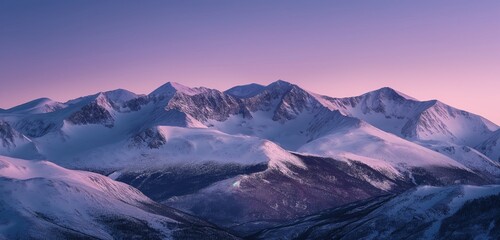 A mountainous landscape at dusk, the last traces of sunset casting a purple hue over the snow-covered peaks, transitioning into the night. 32k, full ultra HD, high resolution