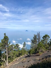 Clouds over the mountain with a blue sky