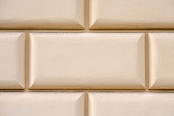 Background from a beige wall with rectangle shapes