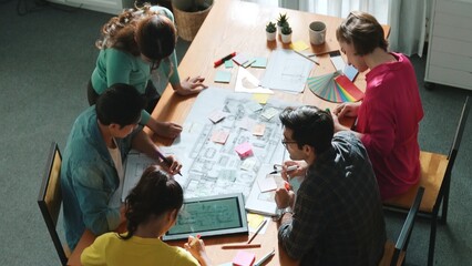 Top view of smart business team work together and holding wrist together at meeting room. Aerial...