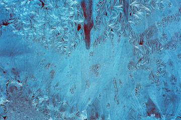 Photo of the frozen window. Natural ice texture on the glass. Abstract nature background