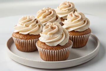 Delightful Apple Cupcakes Topped with Creamy Frosting and Cinnamon Sugar