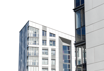 Trendy urban apartment building, highrise flats isolated on white. Modern with window design, new residential complex. High condominium with concrete facade, city housing investment project.