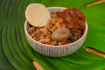 Typical lechona from Tolima with rice