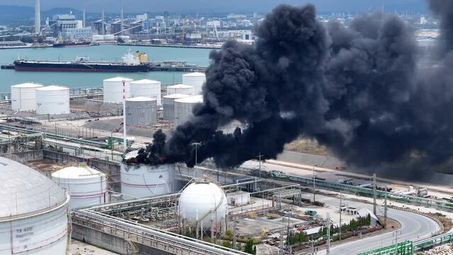 Huge fire exploding at a chemical storage tank in Oil Refinery Plant. as the blaze was likely to spread. Storage tank of Pyrolysis gas exploding.