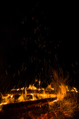 A fire flames with sparks