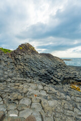 View of Ganh Da Dia or Da Dia Reef is a seashore area of uniformly interlocking basalt rock columns located along the coast in Tuy An town, Phu Yen Province, Vietnam