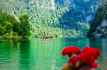 Idyllic landscape view of Tour boat at Königsee. Lake Koenigssee near Berchtesgaden Alps, Bavaria,...
