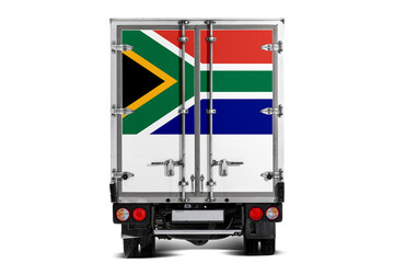 A truck with the national flag of   South Africa depicted on the tailgate drives against a white...