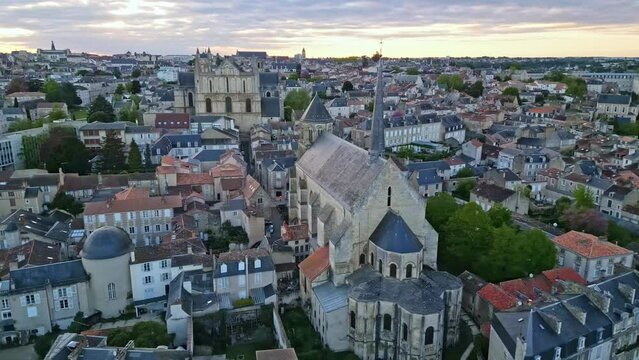 Church of Sainte-Radegonde and Saint Pierre cathedral, Poitiers in France. Aerial sideways and cityscape