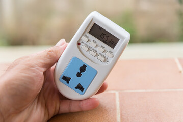 Closeup to digital timer plug 