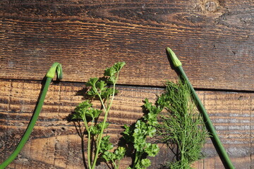 Top view of green vegetables on rustic table, close up