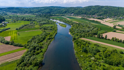 Dunajec river bend in picturesque landscape of Lesser Poland near Tarnow,. Aeral drone view.