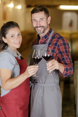 people tasting wine in cellar