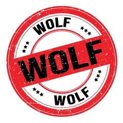 WOLF text written on red-black round stamp sign