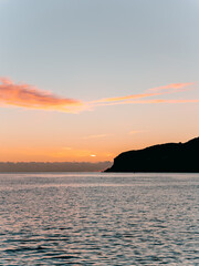 sunrise over the sea and coastline cliffs