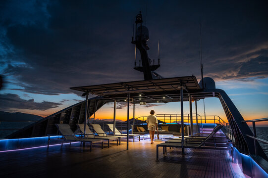 sundeck at twilight on luxury motor yacht
